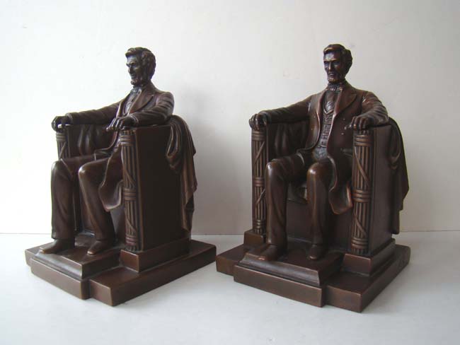 A fine pair of Jennings Brothers "Lincoln in the Chair" antique bookends circa 1925